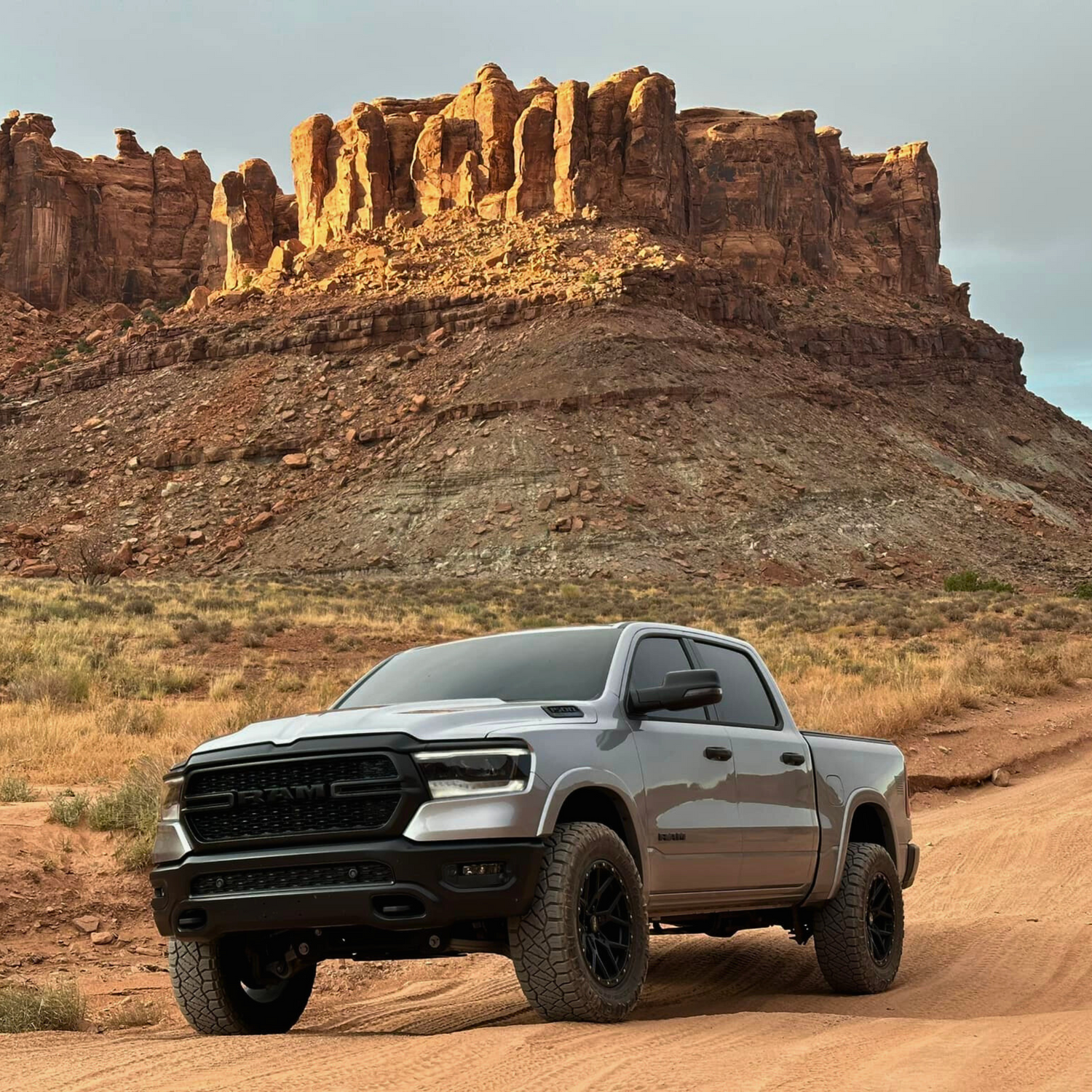 2019-2024 Ram 1500 with B2 Fabrication exhaust system installed, showcasing aggressive exhaust tips and stainless steel design